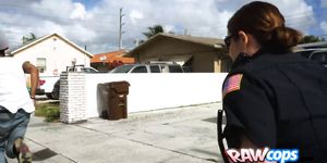 Tattoo dude gets busted for having a massive cock hiding in his pants by two horny police officers